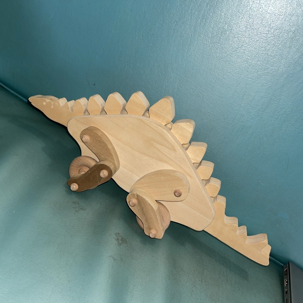 Wooden Stegosaurus Toy Rolls Along And Limbs Move Moving Wheels Natural Wood‎